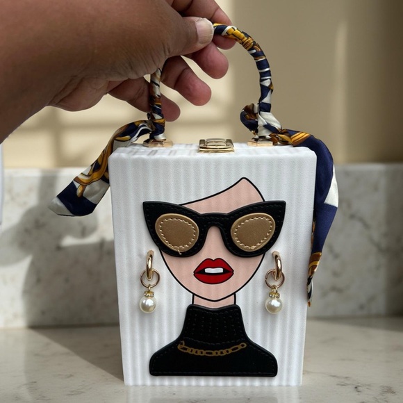 Stylish White and Black Mini Bag with Gold Accents - Picture 3 of 3